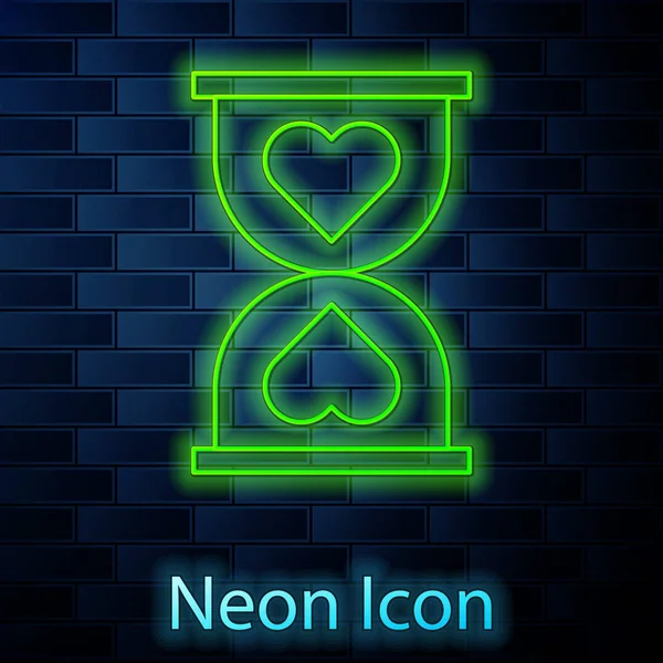 Glödande neon linje Hjärta i centrum gammalt timglas ikon isolerad på tegel vägg bakgrund. Alla hjärtans dag. Vektor Illustration — Stock vektor