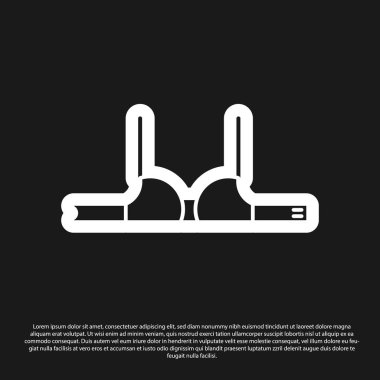 Siyah sütyen simgesi siyah arkaplanda izole edilmiş. Kadın iç çamaşırı. Vektör İllüstrasyonu