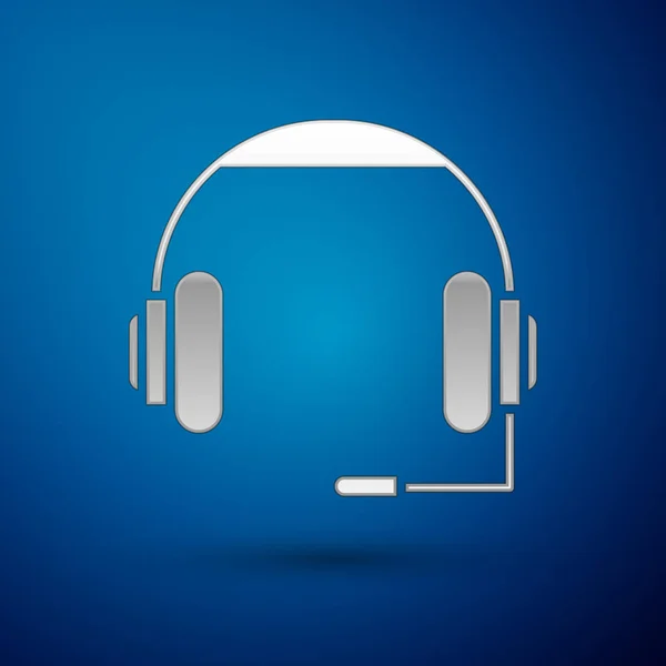 Icono de auriculares plateados aislado sobre fondo azul. Auriculares. Concepto para escuchar música, servicio, comunicación y operador. Ilustración vectorial — Archivo Imágenes Vectoriales