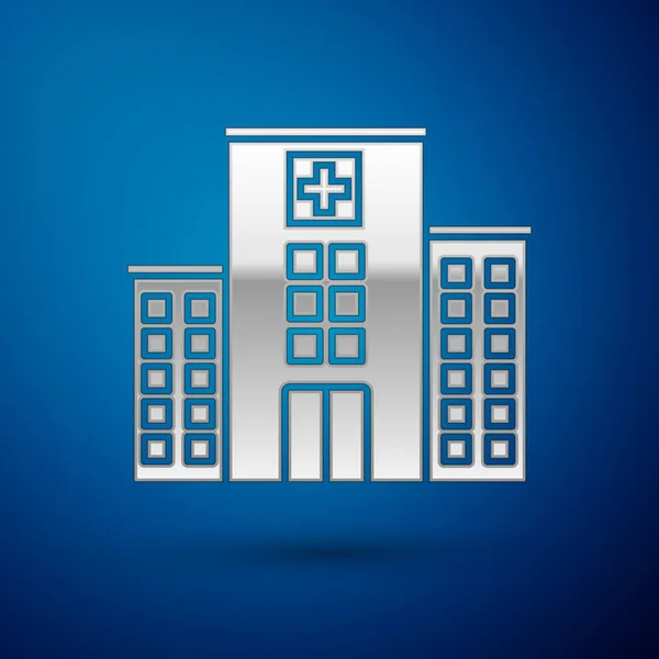 Silver Medical hospital building with cross icon isolated on blue background. Medical center. Health care. Vector Illustration