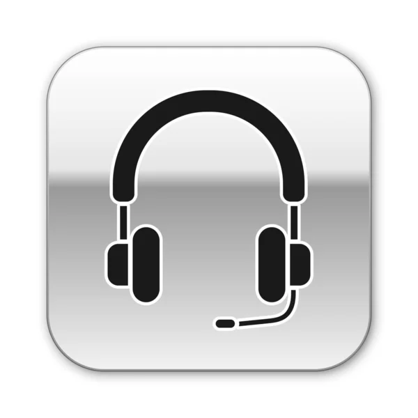 Icono de auriculares negros aislado sobre fondo blanco. Auriculares. Concepto para escuchar música, servicio, comunicación y operador. Botón cuadrado plateado. Ilustración vectorial — Vector de stock