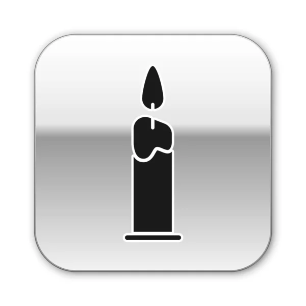 Black Burning candle in candlestick icon isolated on white background. Cylindrical candle stick with burning flame. Silver square button. Vector Illustration — Stock Vector