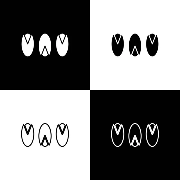 Set icône de noix de pistache isolé sur fond noir et blanc. Illustration vectorielle — Image vectorielle