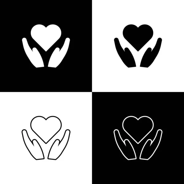 Set Corazón a mano icono aislado sobre fondo blanco y negro. Mano dando símbolo de amor. Símbolo de San Valentín. Ilustración vectorial — Archivo Imágenes Vectoriales