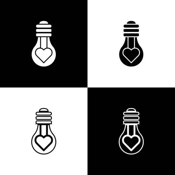 Set Heart shape in a light bulb icon isolated on black and white background. Love symbol. Valentine day symbol. Vector Illustration — Stock Vector