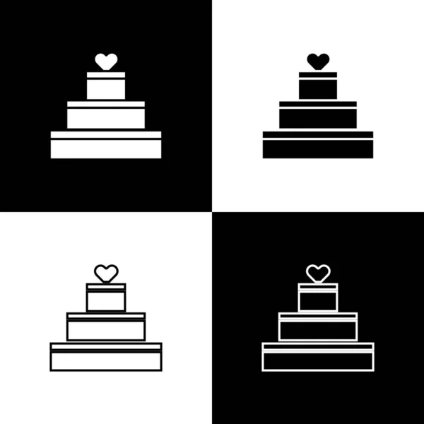 黒と白の背景に隔離されたハートアイコンとウェディングケーキを設定します。バレンタインデーのシンボル。ベクターイラスト — ストックベクタ