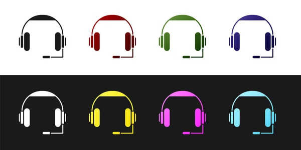 Establecer icono de auriculares aislados en fondo blanco y negro. Auriculares. Concepto para escuchar música, servicio, comunicación y operador. Ilustración vectorial — Vector de stock