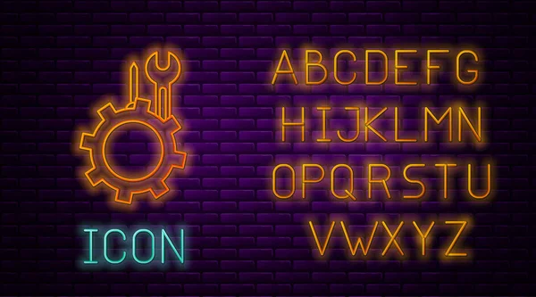 Gloeiende neon lijn Wrench en schroevendraaier in versnelling pictogram geïsoleerd op baksteen muur achtergrond. Aanpassen, service, instelling, onderhoud, reparatie, vaststelling. Neon licht alfabet. Vector Illustratie — Stockvector