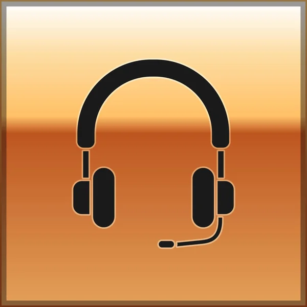 Icono de auriculares negros aislado sobre fondo dorado. Auriculares. Concepto para escuchar música, servicio, comunicación y operador. Ilustración vectorial — Vector de stock