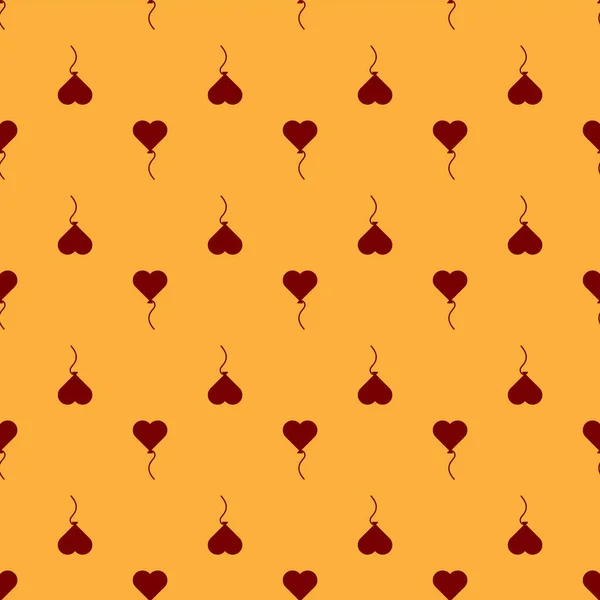 Balões vermelhos em forma de coração com ícone de fita isolado padrão sem costura no fundo marrom. Símbolo do dia dos namorados. Ilustração vetorial — Vetor de Stock