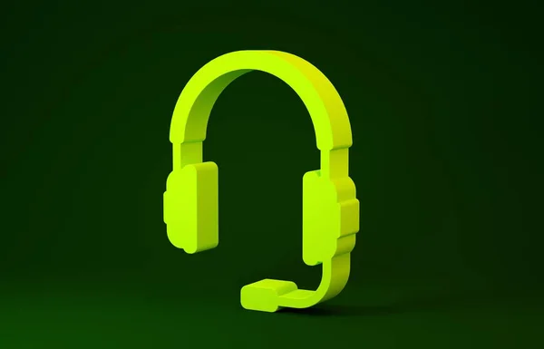 Желтые наушники с значком микрофона изолированы на зеленом фоне. Объект концепции для прослушивания музыки, сервиса, связи и оператора. Концепция минимализма. 3D-рендеринг — стоковое фото