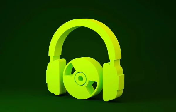 Casques jaunes et icône CD ou DVD isolés sur fond vert. Signe d'écouteur. Symbole de disque compact. Concept de minimalisme. Illustration 3D rendu 3D — Photo