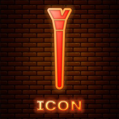 Glowing neon Makeup brush icon isolated on brick wall background.  Vector Illustration