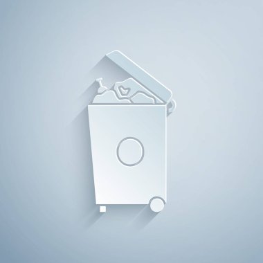 Kağıt kesiği Çöp kutusu simgesi gri arkaplanda izole edildi. Çöp kutusu tabelası. Sepet simgesini geri dönüştür. Ofis çöpü ikonu. Kağıt sanatı tarzı. Vektör İllüstrasyonu