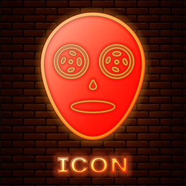Glowing neon Facial cosmetic mask icon isolated on brick wall background. Cosmetology, medicine and health care.  Vector Illustration