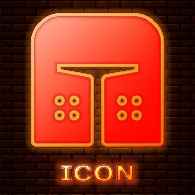Glowing neon Medieval iron helmet for head protection icon isolated on brick wall background.  Vector Illustration