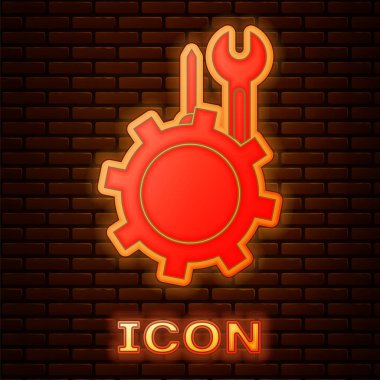 Glowing neon Wrench and screwdriver in gear icon isolated on brick wall background. Adjusting, service, setting, maintenance, repair, fixing.  Vector Illustration