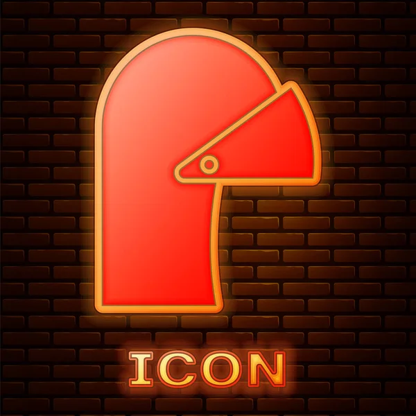 Glowing neon Medieval iron helmet for head protection icon isolated on brick wall background.  Vector Illustration