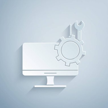 Gri arkaplanda izole edilmiş tornavida ve ingiliz anahtarı simgesi ile bilgisayar kesimi monitörü. Ayarlama, servis, ayar, bakım, onarım. Kağıt sanatı tarzı. Vektör İllüstrasyonu