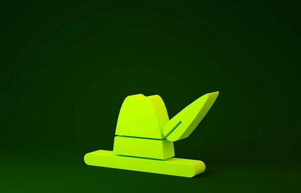 Yellow Oktoberfest hat icon isolated on green background. Hunter hat with feather. German hat. Minimalism concept. 3d illustration 3D render — 스톡 사진