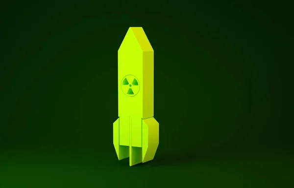 Ícone de foguete nuclear amarelo isolado no fundo verde. Uma bomba voa para baixo. Conceito de minimalismo. 3D ilustração 3D render — Fotografia de Stock