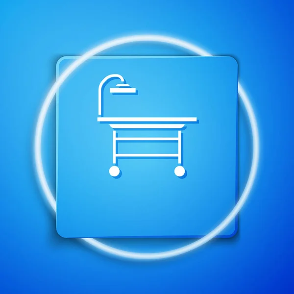 Bílá ikona operačního stolu izolovaná na modrém pozadí. Modré tlačítko. Vektorová ilustrace — Stockový vektor