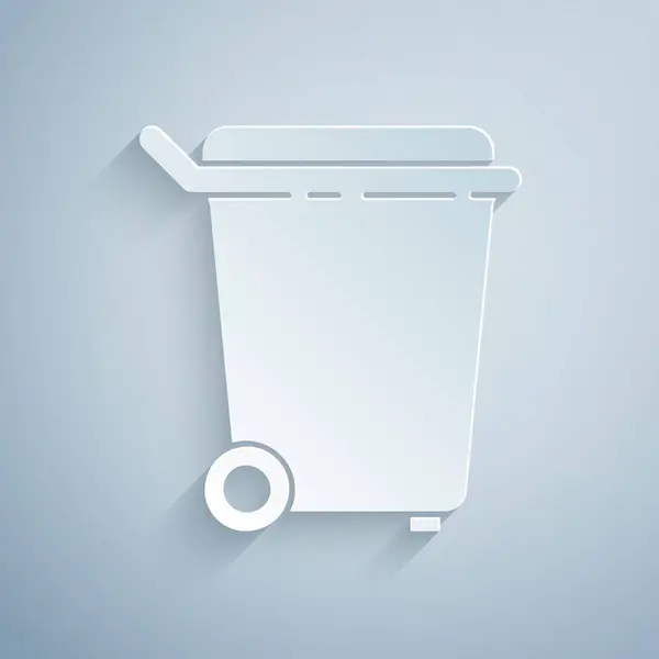 Paper cut Trash can icon isolated on grey background. Garbage bin sign. Recycle basket icon. Office trash icon. Paper art style. Vector Illustration — Stock Vector