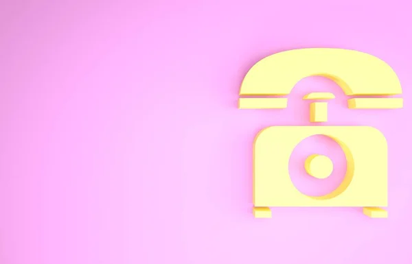 Значок жовтого телефону ізольовано на рожевому фоні. Стаціонарний телефон. Концепція мінімалізму. 3D ілюстрація 3D рендеринга — стокове фото