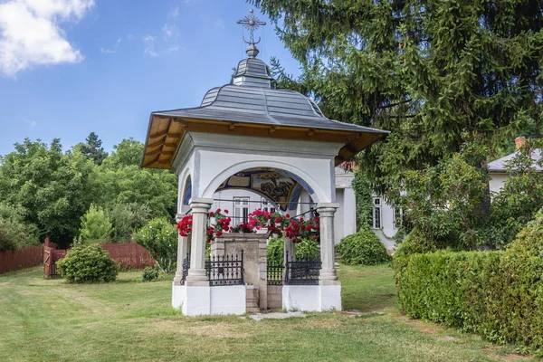 stock image Covered water fount in Ciolanu Orthodox Monastery near Tisau and Magura villages in Romania