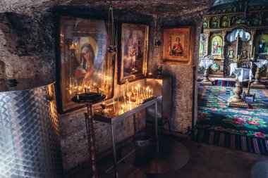 Interior of a cave monastery in Orheiul Vechi natural and historical complex near Trebujeni village, Moldova clipart