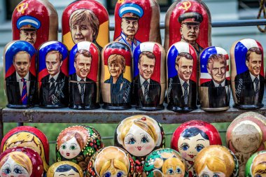 Chisinau, Moldova - July 17, 2019: Political matryoshka dolls on a small flea outdoor market in central part of Chisinau city clipart