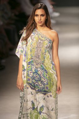 A model walks the runway during the Czarina Fashion Show Summer 2019 collection during Art, Hearts and Fashion Swim 2018 at the Faena Forum in Miami Beach on July 15th, 201