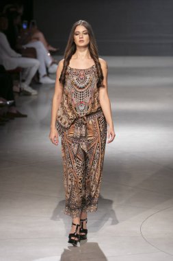 A model walks the runway during the Czarina Fashion Show Summer 2019 collection during Art, Hearts and Fashion Swim 2018 at the Faena Forum in Miami Beach on July 15th, 2018