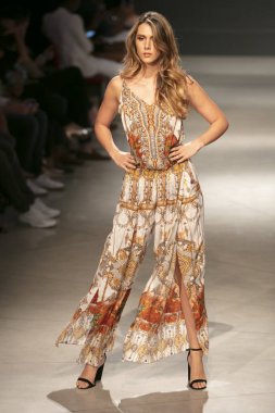 A model walks the runway during the Czarina Fashion Show Summer 2019 collection during Art, Hearts and Fashion Swim 2018 at the Faena Forum in Miami Beach on July 15th, 2018