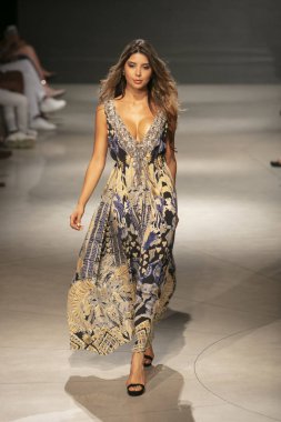 A model walks the runway during the Czarina Fashion Show Summer 2019 collection during Art, Hearts and Fashion Swim 2018 at the Faena Forum in Miami Beach on July 15th, 2018