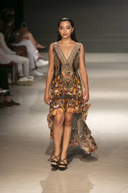 A model walks the runway during the Czarina Fashion Show Summer 2019 collection during Art, Hearts and Fashion Swim 2018 at the Faena Forum in Miami Beach on July 15th, 2018