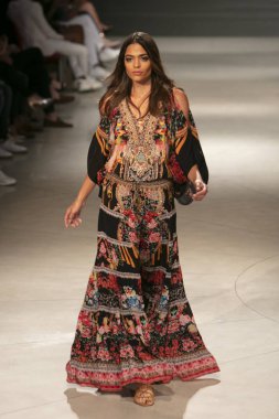 A model walks the runway during the Czarina Fashion Show Summer 2019 collection during Art, Hearts and Fashion Swim 2018 at the Faena Forum in Miami Beach on July 15th, 2018