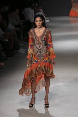 A model walks the runway during the Czarina Fashion Show Summer 2019 collection during Art, Hearts and Fashion Swim 2018 at the Faena Forum in Miami Beach on July 15th, 2018