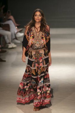 A model walks the runway during the Czarina Fashion Show Summer 2019 collection during Art, Hearts and Fashion Swim 2018 at the Faena Forum in Miami Beach on July 15th, 2018