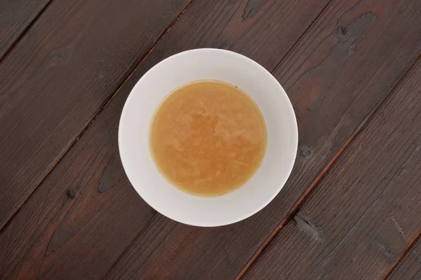 Sopa de cebola em uma mesa — Fotografia de Stock