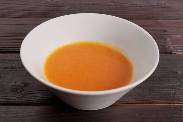 Dýňová polévka s rajčaty na stůl — Stock fotografie