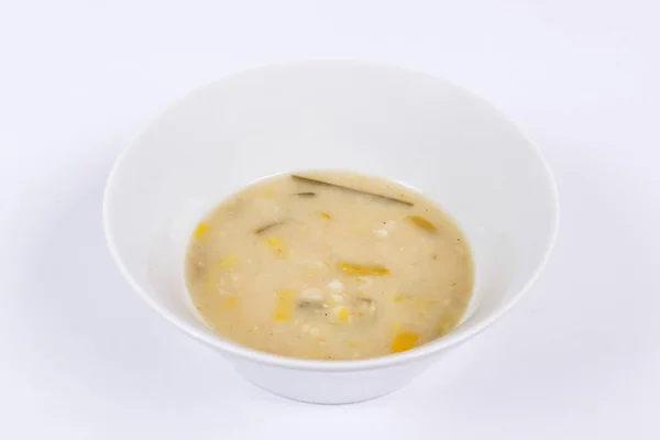 Kvasinek polévka se zeleninou na bílé — Stock fotografie