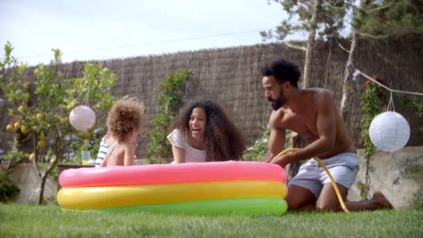 Family Having Fun In Garden — Stock Video