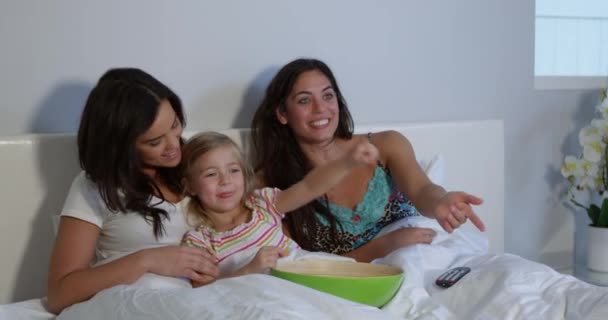 Young girl watching TV — Stock Video