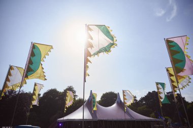 Flags And Marquee At Music Festival clipart