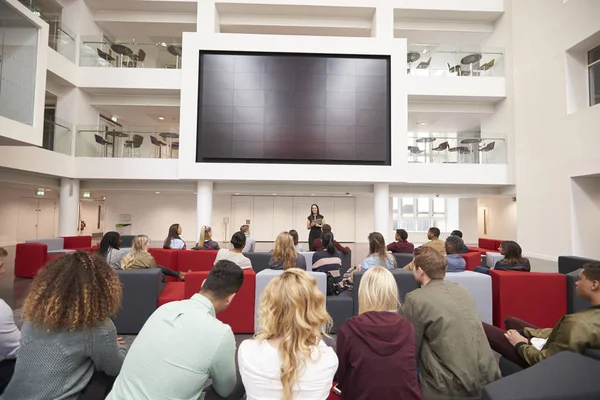 Students at a lecture in a university atrium — Stock Photo, Image