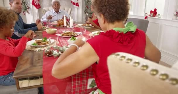 Family With Grandparents Enjoying Christmas Meal — Stock Video