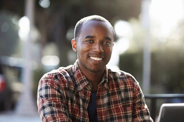 Young man looking at camera — Stock Photo, Image