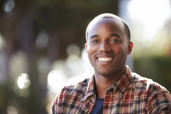 Young man looking at camera — Stock Photo, Image