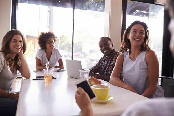 Friends sitting at cafe — Stock Image Friends sitting at cafe Royalty Free Stock Photos